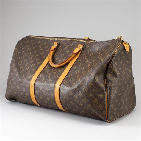 louis vuitton weekend bag womens|authenticate louis vuitton bag.